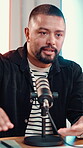 Talking, podcast and microphone with man in recording studio for live stream, broadcasting and radio host. Content creation, news anchor and reporter with person for media, speaker and journalist