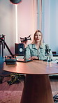 Woman, podcast and face with talk for drone, tech or product review at recording studio. Person, speaker and talk show host with microphone, explain or content creation on live stream in Australia