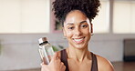Fitness, face and girl with water at health club for hydration, exercise break and recovery. Happy, person and liquid bottle in wellness studio for workout refresh, thirsty or rest from yoga routine