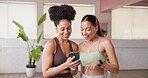 Fitness, women and friends laughing with phone in yoga studio for funny post, show meme or resting. Pilates break, people and happy with smartphone at health club for comic exercise video and gossip
