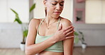 Pilates, shoulder pain and injury with woman in studio for joint sprain, workout accident and fibromyalgia. Exercise emergency, inflammation and tension with person in yoga club or class for bruise