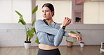 Fitness, girl and stretching arms in studio to start yoga routine, improve flexibility and wellness. Yogi, person and warm up at health club for pilates preparation, getting ready or muscle exercise
