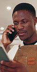 Black man, waiter and phone call with tablet at cafe for discussion, online order and confirm takeaway. Male person, mobile and digital for inventory management, stock check and chat for reservation