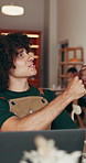 Cafe, man and fist bump with laptop for review, restaurant feedback or small business order. Hospitality, barista or store manager with technology for coffee shop, teamwork and support for goals