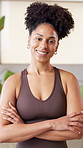 Woman, arms crossed and happy with face at gym for fitness, pride or confidence at wellness class. Person, smile and portrait in studio for pilates, exercise and excited at club in Costa Rica