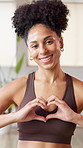Heart, hands and face of woman for gym, fitness and training in health club. Exercise studio, portrait and african person with love, emoji and care gesture for wellness, workout or cardio support