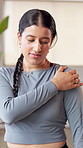 Shoulder pain, health and woman in studio for yoga, wellness and exercise with muscle strain. Pilates club, injury and person massage with tension, joint ache and inflammation for workout accident