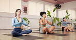 Woman, yoga and namaste on floor at gym with breathing, eyes closed and awareness with zen in class. People, group and meditation with mindfulness, routine and peace on mat for wellness at club