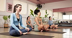 Woman, yoga class and laugh on floor at gym with joke, breathing exercise and funny with zen in class. People, easy pose and meditation with mindfulness, happy or peace on mat at wellness club