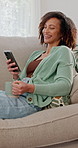 Phone, coffee and woman laugh on sofa for online communication, meme and joke on app. Mobile, tea and funny person in home, reading message and watch comedy video on social media website to relax
