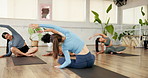 Stretching, yoga and back of women in class for exercise, wellness and practice for flexibility. Gym, fitness club and people with instructor in pilates lesson for balance, health and wellbeing