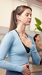 Yoga, breathing and woman in studio, heart health and balance with wellness, mindfulness and zen. Yogi, fitness and person with stress relief, holistic healing and pilates with meditation and chakra