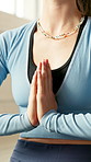 Hands, namaste pose and yoga in class at gym for breathing exercise on floor, peace or self care at studio. Woman, meditation and mindfulness with mudra, zen or routine for awareness at wellness club