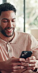 Phone, funny and typing with man in home for social media, text message and comedy comment. Online chat forum, notification and communication app with person laughing in living room for connection