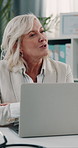 Mature, doctor and laptop with consultation in office for check up results, diagnosis and healthcare options. Woman, treatment discussion and technology for prescription, planning and conversation