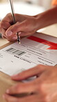 Packaging, hand of woman or writing on label for logistics, shipping process or distribution information. Order preparation, parcel address sticker or entrepreneur with pen, transport or supply chain