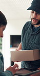 Box, signature and tablet with delivery man giving order to customer for home shipping. App, logistics service and package with person at entrance to apartment to complete online shopping process