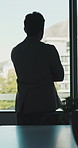 Back, business and man in office, view and financial agency with ideas for investment deal. Shadow, window and person with pride, professional and opportunity for trading, solution and decision