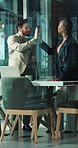 Boardroom, high five and laptop with business people in glass office together for development. Collaboration, computer and success with employee team in corporate workplace for goals or target