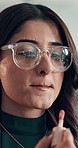 Phone, woman and apply lip gloss in office, getting ready and glasses for brand awareness campaign. Advertising, lipstick and marketer check reflection with tech, content creation and creative agency
