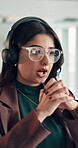 Call center, glasses and Indian woman in office with headset, contact us and help in crm service. Telecom, reflection or consultant in agency with tech, online advice or feedback in client support.