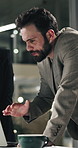 Business, man and meeting with laptop at night for accounting, planning and financial report. People, discussion and pc for research, review budget and team feedback for investment deadline in office