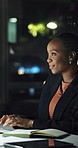Night, smile and typing with business black woman in office for financial management or review. Computer, finance and report with happy African employee in corporate workplace for investment trading