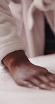 Hand, bedroom and woman with blanket, cleaning and chore with mattress, comfort and calm. Person, apartment and home with sheets, bedding duvet and organized with daily routine, tidy and morning