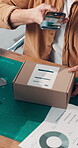 Phone, scan and shipping with hands of person for delivery information, logistics and packaging process. Supply chain, ecommerce and courier information with employee and box for startup inventory