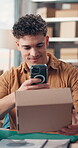 Small business, man and picture of package in warehouse for parcel info, supply chain or logistics. Online shop, person and photo of box for order shipping, distribution service or proof of condition