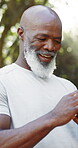 Senior black man, phone and fitness outdoor for research, social media and exercise progress. Below, elderly person or bokeh with mobile, training website and surfing internet for sports blog at park