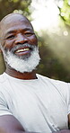 Fitness, arms crossed and face with old man outdoor for smile, retirement and workout break. Happiness, runner and wellness with senior black person in nature for health, exercise and elderly athlete