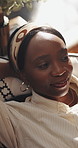 Relax, thinking and black woman on sofa, above and smile with ideas, resting and daydreaming Home, calm and African person on couch, reflection and afternoon nap with wonder, memory and weekend break