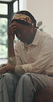 Thinking, sad and black woman with depression on couch for reflection, contemplation and disappointment. Upset, shake head and person with anxiety, mental health and thoughts in home living room.