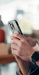 Phone, hands and man in office with networking, communication or social media on mobile app. Technology, research and male person with cellphone for contact, chatting or texting in workplace.