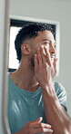 Skincare, mirror and cream with man in bathroom for self care, beauty or morning routine. Grooming, hygiene and lotion with reflection of person in home for clean, dermatology and clear skin