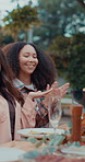 Friends, lunch celebration and clapping in garden for birthday party, social gathering and reunion. Group, happy women and applause at dinner in backyard for thanksgiving event, bonding and support