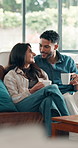 Happy people, couple and relax on sofa with coffee for morning gossip, conversation or healthy marriage. Smile, woman and man bonding together in home with drink, love and connection in relationship.
