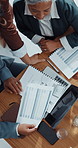Hands, people and reading documents in meeting  for accounting records of company expenditure. Above, team and paperwork for financial report, budget review and performance graphs for cost management