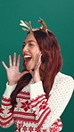 Christmas, announcement and shouting with woman in studio for awareness, promotion or sale. Giveaway, news and celebration with happy person on green background for festive season or retail marketing
