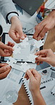 Tablet screen, puzzle and above of business people hands in office for smart product, website ui or research. Branding, creative solution and teamwork for employees in agency with documents or graphs