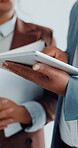 Business people, hands and tablet in meeting for discussion, online research and project management. Team, communication and scroll with tech in office for budget planning, document review and info.