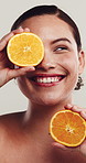 Smile, woman and orange for skincare in studio with beauty, hydration and facial healing. Thinking, person and organic fruit with natural glow, healthy skin and collagen treatment on white background