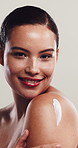 Shoulder, woman and cream for skincare with face, natural dermatology or sunscreen product. Lotion, cosmetics and happy model with moisturizer for body care, beauty and white background in studio