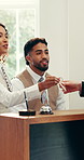 Hotel concierge, hospitality and team with key for booking, availability and schedule. Business lodge, receptionist and people with confirmation at front desk for reservation management or checkin