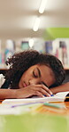 Child, sleeping or tired in library with homework stress, education burnout or information overload. Exhausted, student or girl writing with learning disability, school assignment or academic project
