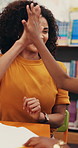 Education, teacher or high five child in library for lesson support, writing activity or growth. Happy, kid or tutor with celebration for learning progress, knowledge development or success at school