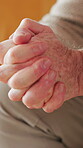 Arthritis, hands and pain with senior person closeup in retirement home for condition or injury. Fibromyalgia, inflammation and lupus with elderly man in apartment for circulation or tension