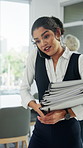 Office, phone call and woman with paperwork, chaos and legal assistant with workload or multitasking. Law firm, stress and talking with client for case schedule, intern and overwhelmed with documents