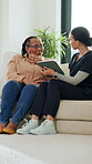 Tablet, talking and old woman with nurse on sofa for healthcare, retirement or support. Online patient records, treatment plan and consulting advice with people in nursing home for medical caregiver
